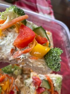 veggie pizza on crescent roll crust with broccoli and bell peppers